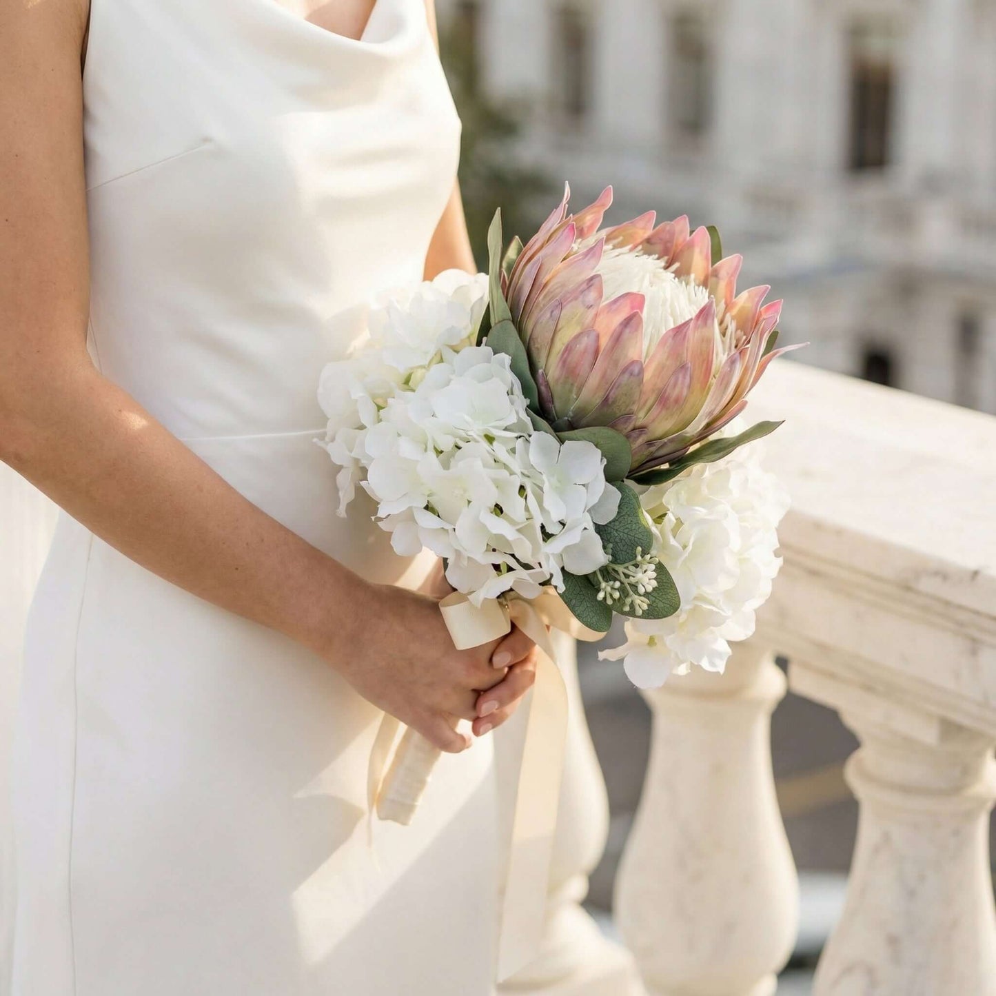 Lavish Myriss Bridal silk flowers Bouquet by Eve Couture adorned with a variety of silk artificial flowers including silk hydrangea, perfect for creating a stunning wedding silk flowers bouquet.