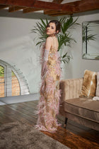 Luxury eveningwear and red carpet gowns. Elegant model showcasing luxury evening wear and red carpet gowns in a stylish living room setting.