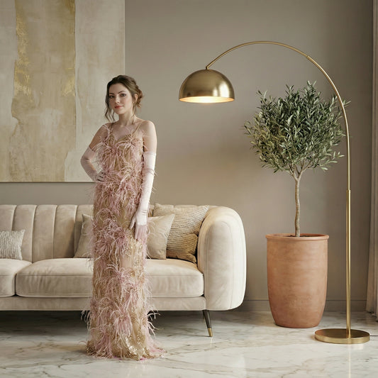 An exquisite view of the Gwyneth Ball Gown by Eve Couture London, showcasing opulent fully embellished ostrich feathers and intricate detailing, embodying the essence of haute couture in pink, perfect for any luxury evening gown occasion.