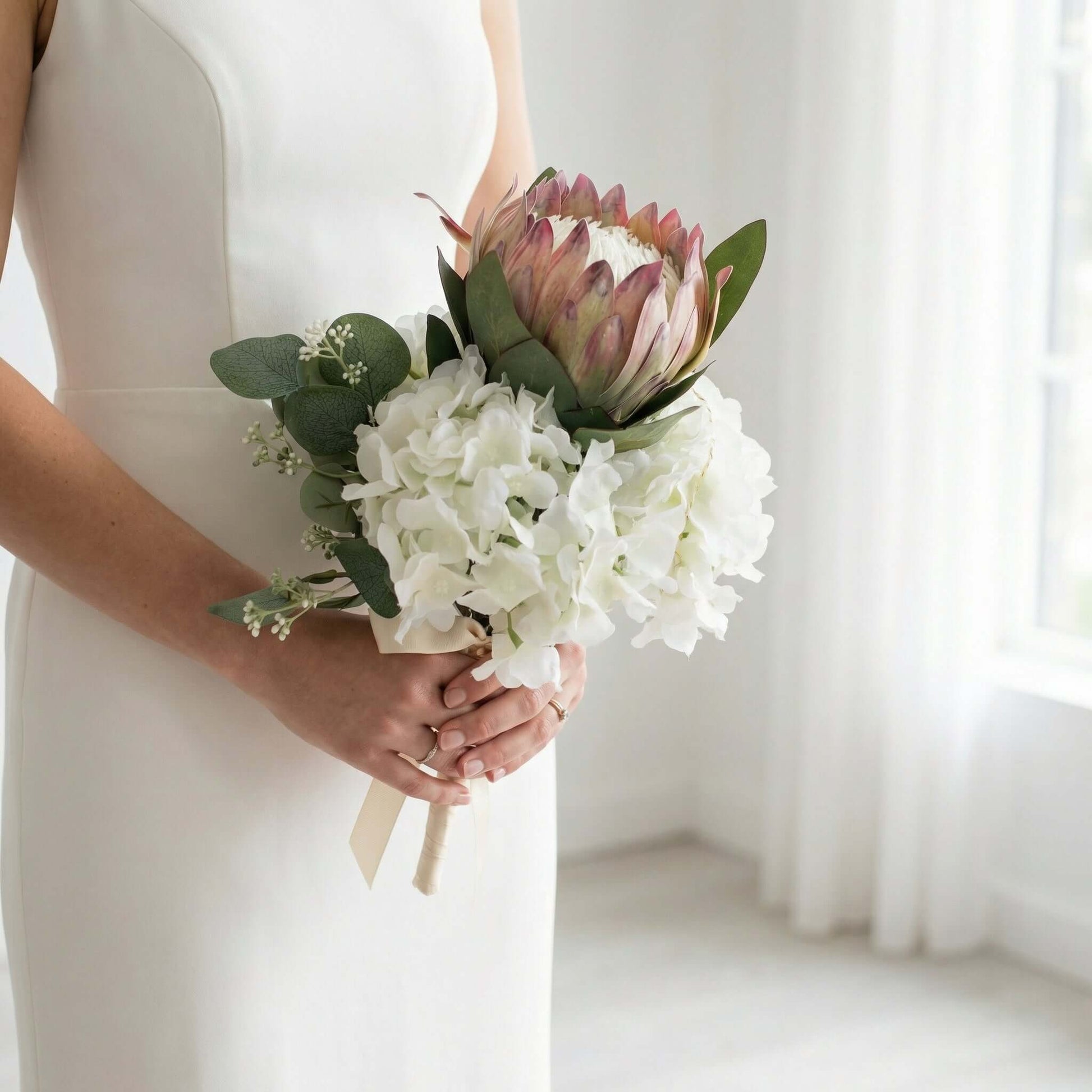 Stunning close-up of Myriss Bridal Silk Flowers Bouquet by Eve Couture, showcasing silk artificial flowers and delicate silk hydrangea flowers, ideal for a bridal silk flowers bouquet.