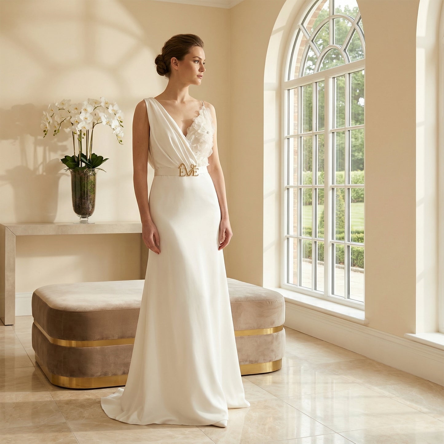 A romantic pose featuring the Aphrodite Wedding Dress by Eve Couture London, highlighting the elegant silhouette of this custom bridal gown for a sophisticated wedding.
