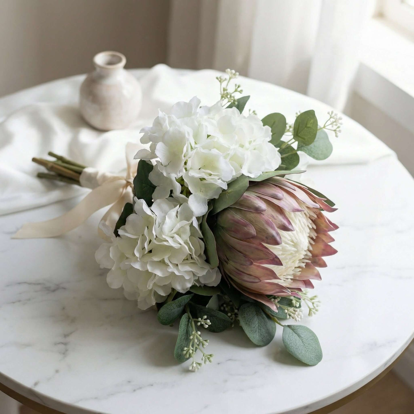 Gorgeous Myriss Bridal Silk Flowers Bouquet by Eve Couture highlighted with silk hydrangea flowers and elegant eucalyptus, a sophisticated option for bridal silk flowers bouquet.